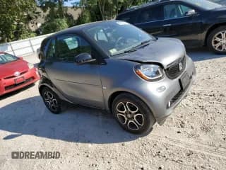 ✅ 2017 Smart fortwo Pure • VIN: WMEFJ9BA3HK229906 • Lot: 69523284. Wystawiony na Copart z przebiegiem 26 444 mil. Bezpłatny archiwum sprzedaży aukcyjnych z USA i szczegółowy raport historii pojazdu na DreamBid. Zdjęcie 4.