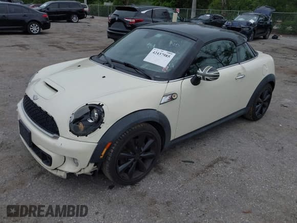 ✅ 2013 MINI Coupe S • VIN: WMWSX3C53DT408734 • Lot: 42437985. Listed on IAAI with 141,257 mi. Free auction sales archive from the USA and detailed vehicle history report at DreamBid. Image 18.