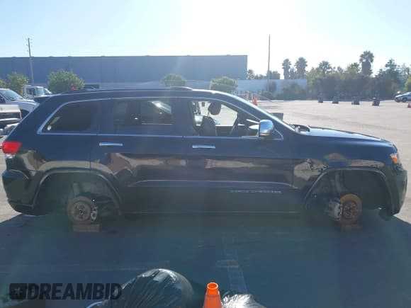 ✅ 2015 Jeep Grand Cherokee Overland • VIN: 1C4RJFCT0FC787911 • Lot: 43399363. Listed on IAAI with Not provided. Free auction sales archive from the USA and detailed vehicle history report at DreamBid. Image 12.