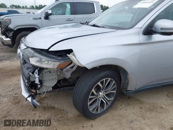 2016 Mitsubishi Outlander SE with VIN JA4AD3A35GZ005763, listed as a IAAI auction lot 42892229 with 222,088 mi miles and . Bid and sale history available at DreamBid. Image 12.