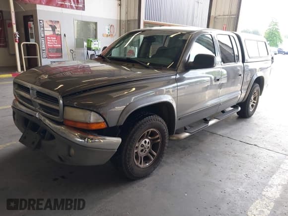 ✅ 2004 Dodge Dakota SLT • VIN: 1D7HL48N94S634652 • Lot: 42999215. Listed on IAAI with 195,310 mi. Free auction sales archive from the USA and detailed vehicle history report at DreamBid. Image 2.