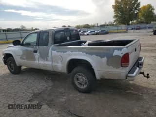 ✅ 1997 Dodge Dakota • VIN: 1B7GG23Y8VS161313 • Lot: 77646454. Wystawiony na Copart z przebiegiem 286 443 mil. Bezpłatny archiwum sprzedaży aukcyjnych z USA i szczegółowy raport historii pojazdu na DreamBid. Zdjęcie 2.