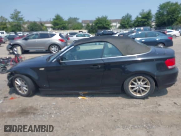 ✅ 2010 BMW 1 Series 128i • VIN: WBAUN1C55AVH81750 • Lot: 42411484. Listed on IAAI with 124,432 mi. Free auction sales archive from the USA and detailed vehicle history report at DreamBid. Image 14.