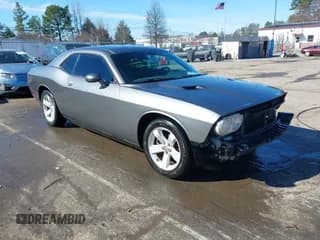 ✅ 2012 Dodge Challenger SXT • VIN: 2C3CDYAG9CH206661 • Lot: 41588889. Wystawiony na IAAI z przebiegiem 218 581 mil. Bezpłatny archiwum sprzedaży aukcyjnych z USA i szczegółowy raport historii pojazdu na DreamBid. Zdjęcie 1.