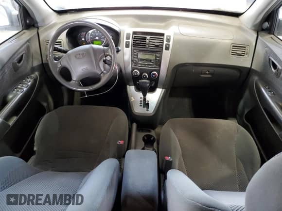 2006 Hyundai Tucson GLS with VIN KM8JN72D26U346076, listed as a Copart auction lot 77447474 with 123,993 mi miles and Salvage title. Bid and sale history available at DreamBid. Image 8.