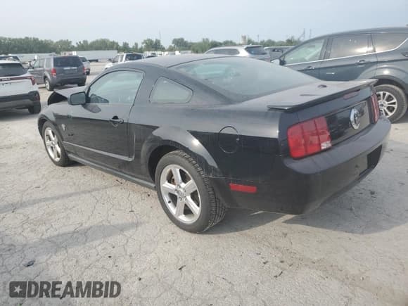✅ 2009 Ford Mustang • VIN: 1ZVHT80N495129229 • Lot: 71190415. Listed on Copart with 106,896 mi. Free auction sales archive from the USA and detailed vehicle history report at DreamBid. Image 2.