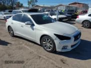 ✅ 2015 Infiniti Q50 Premium • VIN: JN1BV7AP0FM358086 • Lot: 43644990. Listed on IAAI with 149,883 mi. Free auction sales archive from the USA and detailed vehicle history report at DreamBid. Image 1.