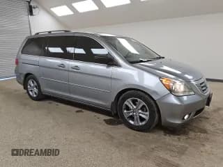 ✅ 2009 Honda Odyssey Touring • VIN: 5FNRL38959B020293 • Lot: 91262625. Wystawiony na Copart z przebiegiem 218 525 mil. Bezpłatny archiwum sprzedaży aukcyjnych z USA i szczegółowy raport historii pojazdu na DreamBid. Zdjęcie 4.