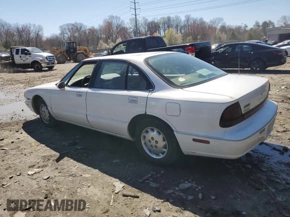 ✅ 1999 Oldsmobile 88 LS • VIN: 1G3HN52K3X4821970 • Lot: 79999164. Wystawiony na Copart z przebiegiem 249 701 mil. Bezpłatny archiwum sprzedaży aukcyjnych z USA i szczegółowy raport historii pojazdu na DreamBid. Zdjęcie 2.