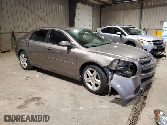 ✅ 2010 Chevrolet Malibu 1LS • VIN: 1G1ZB5EB4AF203697 • Lot: 73420834. Listed on Copart with 103,662 mi. Free auction sales archive from the USA and detailed vehicle history report at DreamBid. Image 4.