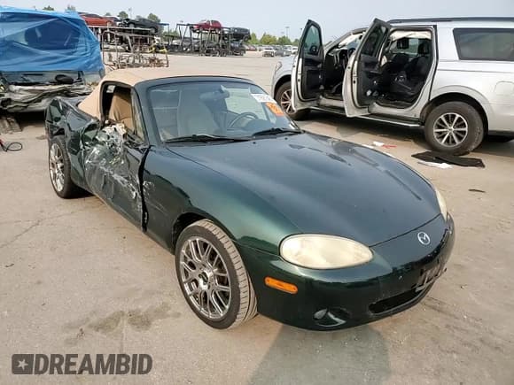 ✅ 2003 Mazda MX-5 Miata Cloth • VIN: JM1NB353130304835 • Lot: 71691345. Wystawiony na Copart z przebiegiem 60 591 mil. Bezpłatny archiwum sprzedaży aukcyjnych z USA i szczegółowy raport historii pojazdu na DreamBid. Zdjęcie 13.