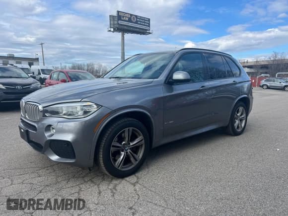 ✅ 2015 BMW X5 xDrive50i • VIN: 5UXKR6C50F0J76918 • Lot: 48632265. Listed on Copart with 141,000 mi. Free auction sales archive from the USA and detailed vehicle history report at DreamBid. Image 2.