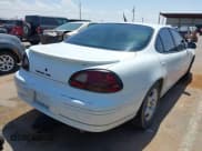 ✅ 2001 Pontiac Grand Prix SE • VIN: 1G2WK52J11F151830 • Lot: 42355528. Wystawiony na IAAI z przebiegiem 176 070 mil. Bezpłatny archiwum sprzedaży aukcyjnych z USA i szczegółowy raport historii pojazdu na DreamBid. Zdjęcie 4.
