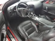 ✅ 2012 Chevrolet Corvette 1LT • VIN: 1G1YE2DW1C5103605 • Lot: 61152905. Listed on Copart with 143,458 mi. Free auction sales archive from the USA and detailed vehicle history report at DreamBid. Image 8.