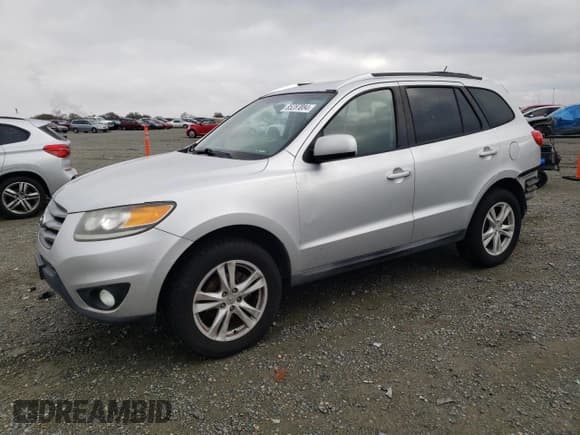 ✅ 2012 Hyundai Santa Fe SE • VIN: 5XYZHDAG7CG108357 • Lot: 85287084. Listed on Copart with 162,684 mi. Free auction sales archive from the USA and detailed vehicle history report at DreamBid. Image 1.