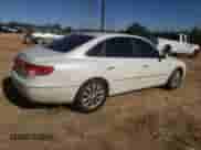 2006 Hyundai Azera SE z VIN KMHFC46F46A134061, wystawiony jako Copart lot #87227344 z przebiegiem 224 496 mil mil oraz Szkoda całkowita • Salvage title. Historia ofert i sprzedaży dostępna na DreamBid. Obrazek 3.