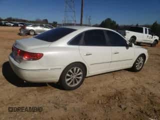 2006 Hyundai Azera SE z VIN KMHFC46F46A134061, wystawiony jako Copart lot #87227344 z przebiegiem 224 496 mil mil oraz Szkoda całkowita • Salvage title. Historia ofert i sprzedaży dostępna na DreamBid. Obrazek 3.