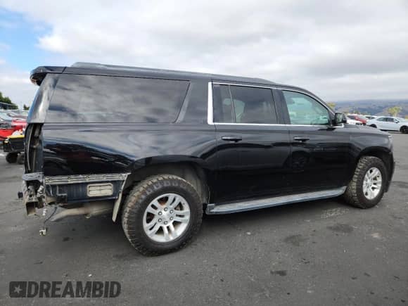 2015 Chevrolet Suburban LT with VIN 1GNSKJKC6FR660894, listed as a Copart auction lot 82732065 with 47,176 mi miles and Salvage title. Bid and sale history available at DreamBid. Image 3.