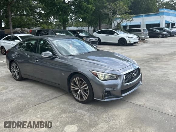 ✅ 2018 Infiniti Q50 Luxe • VIN: JN1EV7AP4JM355648 • Lot: 60669445. Listed on Copart with 92,335 mi. Free auction sales archive from the USA and detailed vehicle history report at DreamBid. Image 1.
