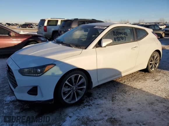 2020 Hyundai Veloster Premium z VIN KMHTG6AF6LU022401, wystawiony jako Copart lot #41692695 z przebiegiem 125 933 mil mil oraz Czysty tytuł • Clean title. Historia ofert i sprzedaży dostępna na DreamBid. Obrazek 1.