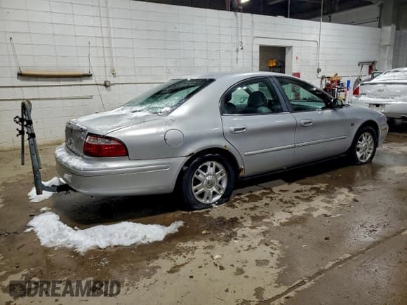 ✅ 2004 Mercury Sable LS Premium • VIN: 1MEFM55S64G607215 • Lot: 94497595. Listed on Copart with 113,980 mi. Free auction sales archive from the USA and detailed vehicle history report at DreamBid. Image 3.