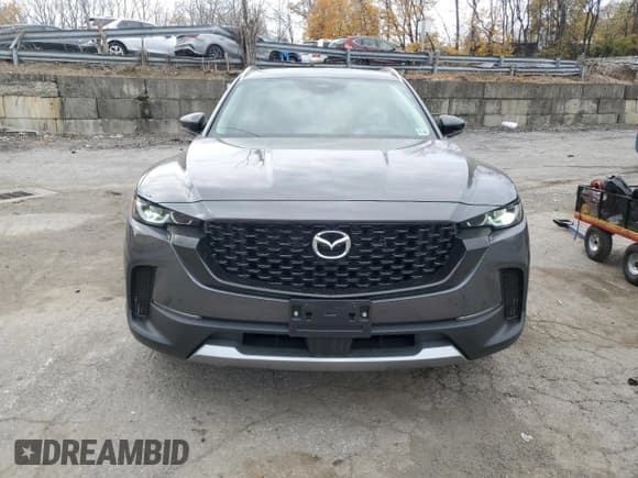 ✅ 2025 Mazda CX-50 Premium • VIN: 7MMVABDY8SN379690 • Lot: 91108085. Listed on Copart with 1,993 mi. Free auction sales archive from the USA and detailed vehicle history report at DreamBid. Image 5.