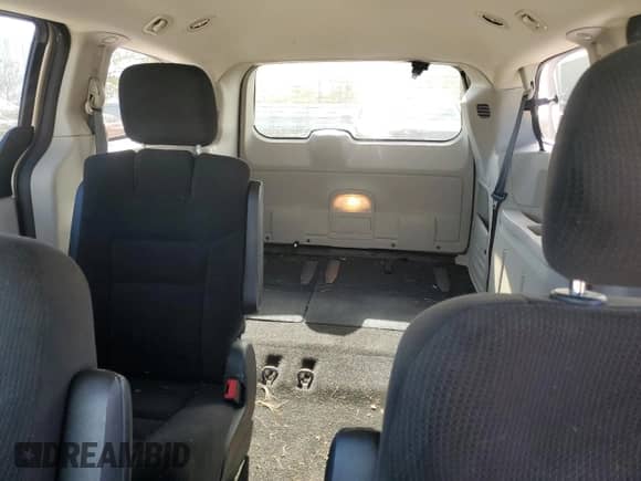 2014 Dodge Grand Caravan SXT с VIN 2C4RDGCG1ER429464, выставлен на аукционе Copart как лот 86646645 с пробегом 209 217 миль миль и Списание • Salvage title. История ставок и продаж доступна на DreamBid. Изображение 10.