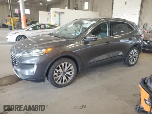 ✅ 2020 Ford Escape Titanium • VIN: 1FMCU9J97LUC13412 • Lot: 81248395. Listed on Copart with 29,645 mi. Free auction sales archive from the USA and detailed vehicle history report at DreamBid. Image 1.