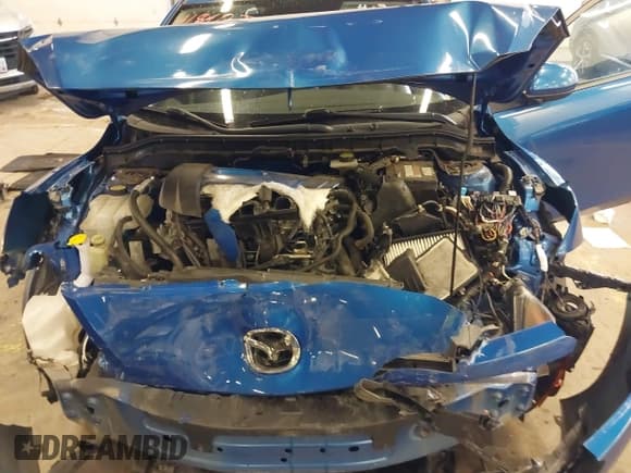 ✅ 2012 Mazda 3 i Touring • VIN: JM1BL1L81C1661610 • Lot: 41840710. Listed on IAAI with 60,567 mi. Free auction sales archive from the USA and detailed vehicle history report at DreamBid. Image 10.