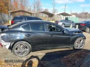 ✅ 2015 Infiniti Q50 Premium • VIN: JN1BV7AR6FM395242 • Lot: 43714296. Listed on IAAI with 90,912 mi. Free auction sales archive from the USA and detailed vehicle history report at DreamBid. Image 14.