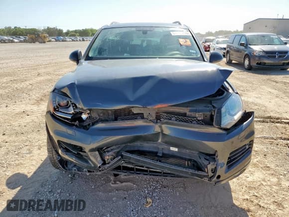 ✅ 2013 Volkswagen Touareg Lux • VIN: WVGEF9BPXDD007888 • Lot: 61243265. Listed on Copart with 90,370 mi. Free auction sales archive from the USA and detailed vehicle history report at DreamBid. Image 5.