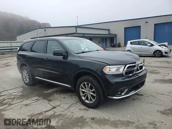 ✅ 2018 Dodge Durango SXT • VIN: 1C4RDJAG8JC198498 • Лот: 93035075. Опубликован ранее на Copart с пробегом 83 324 миль. Бесплатный доступ к архиву аукционных продаж из США и подробный отчёт об истории автомобиля на DreamBid. Изображение 14.