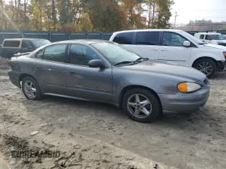 ✅ 2004 Pontiac Grand Am SE1 • VIN: 1G2NF52E14C219911 • Lot: 77460124. Wystawiony na Copart z przebiegiem 66 899 mil. Bezpłatny archiwum sprzedaży aukcyjnych z USA i szczegółowy raport historii pojazdu na DreamBid. Zdjęcie 4.