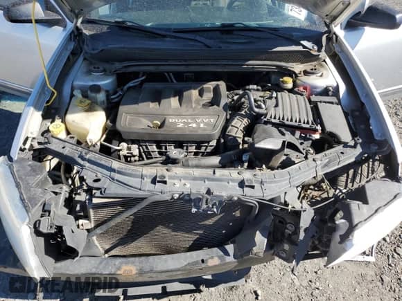 2012 Dodge Avenger SE z VIN 1C3CDZAB8CN322662, wystawiony jako Copart lot #73427604 z przebiegiem 169 690 mil mil oraz Szkoda całkowita • Salvage title. Historia ofert i sprzedaży dostępna na DreamBid. Obrazek 12.