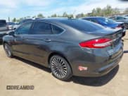 ✅ 2018 Ford Fusion Titanium • VIN: 3FA6P0SU9JR150413 • Лот: 42830416. Опубликован ранее на IAAI с пробегом 60 895 миль. Бесплатный доступ к архиву аукционных продаж из США и подробный отчёт об истории автомобиля на DreamBid. Изображение 3.