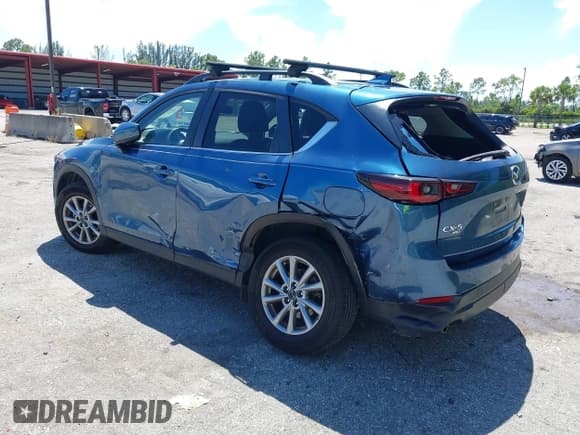 ✅ 2022 Mazda CX-5 S Carbon Edition • VIN: JM3KFBCM5N0620116 • Lot: 43033082. Listed on IAAI with 48,059 mi. Free auction sales archive from the USA and detailed vehicle history report at DreamBid. Image 3.