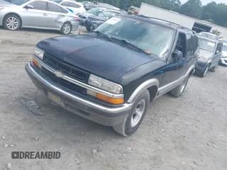 ✅ 1999 Chevrolet Blazer LT • VIN: 1GNCS13W1X2169673 • Lot: 42778174. Wystawiony na IAAI z przebiegiem 127 038 mil. Bezpłatny archiwum sprzedaży aukcyjnych z USA i szczegółowy raport historii pojazdu na DreamBid. Zdjęcie 2.