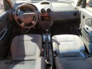 ✅ 2006 Chevrolet Aveo LS • VIN: KL1TD56686B557401 • Lot: 46954465. Wystawiony na Copart z przebiegiem 179 825 mil. Bezpłatny archiwum sprzedaży aukcyjnych z USA i szczegółowy raport historii pojazdu na DreamBid. Zdjęcie 8.