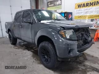 ✅ 2013 Nissan Frontier SV • VIN: 1N6AD0EV5DN734619 • Lot: 41300993. Listed on IAAI with 104,013 mi. Free auction sales archive from the USA and detailed vehicle history report at DreamBid. Image 1.