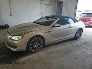 ✅ 2012 BMW 6 Series 650i xDrive • VIN: WBALZ5C59CC619669 • Lot: 67928925. Listed on Copart with 96,696 mi. Free auction sales archive from the USA and detailed vehicle history report at DreamBid. Image 1.