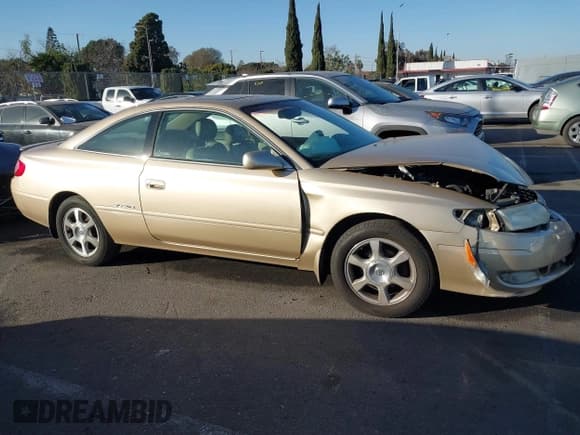 ✅ 2002 Toyota Solara SE • VIN: 2T1CF28P82C555053 • Lot: 41414314. Listed on IAAI with 115,444 mi. Free auction sales archive from the USA and detailed vehicle history report at DreamBid. Image 14.