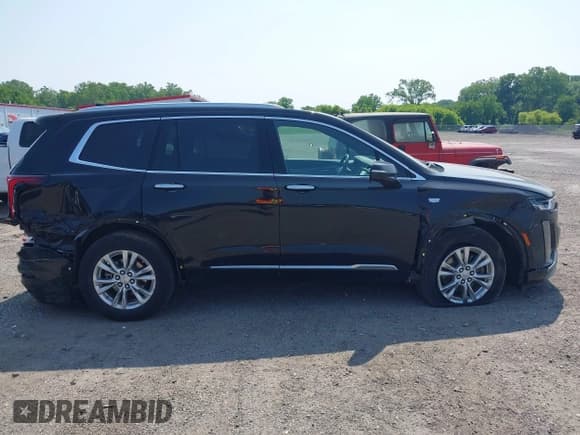 ✅ 2023 Cadillac XT6 AWD Luxury • VIN: 1GYKPBR49PZ169939 • Lot: 42424555. Listed on IAAI with 55,461 mi. Free auction sales archive from the USA and detailed vehicle history report at DreamBid. Image 14.