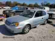 2005 Hyundai Accent GLS with VIN KMHCG35C55U325672, listed as a Copart auction lot 77685964 with 161,228 mi miles and Salvage title. Bid and sale history available at DreamBid. Image 1.