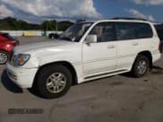 ✅ 2000 Lexus LX 470 • VIN: JT6HT00WXY0105033 • Lot: 69350125. Listed on Copart with 390,031 mi. Free auction sales archive from the USA and detailed vehicle history report at DreamBid. Image 1.