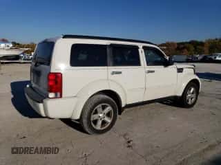 2007 Dodge Nitro SXT с VIN 1D8GU28K37W729848, выставлен на аукционе Copart как лот 77415264 с пробегом 247 756 миль миль и Списание • Salvage title. История ставок и продаж доступна на DreamBid. Изображение 3.
