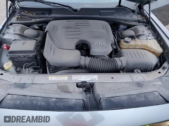 ✅ 2012 Dodge Challenger SXT • VIN: 2C3CDYAG5CH130551 • Lot: 81517564. Wystawiony na Copart z przebiegiem 132 729 mil. Bezpłatny archiwum sprzedaży aukcyjnych z USA i szczegółowy raport historii pojazdu na DreamBid. Zdjęcie 11.