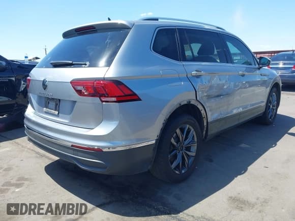 ✅ 2022 Volkswagen Tiguan SE • VIN: 3VV3B7AX9NM067410 • Lot: 42900264. Listed on IAAI with 68,594 mi. Free auction sales archive from the USA and detailed vehicle history report at DreamBid. Image 4.
