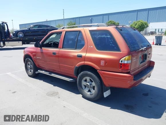 ✅ 1999 Isuzu Rodeo S • VIN: 4S2CK58WXX4346156 • Lot: 42328951. Listed on IAAI with 196,182 mi. Free auction sales archive from the USA and detailed vehicle history report at DreamBid. Image 3.