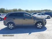 ✅ 2014 Chevrolet Captiva Sport LS • VIN: 3GNAL2EK1ES575989 • Lot: 41757007. Wystawiony na IAAI z przebiegiem 105 190 mil. Bezpłatny archiwum sprzedaży aukcyjnych z USA i szczegółowy raport historii pojazdu na DreamBid. Zdjęcie 13.