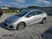 ✅ 2019 Chevrolet Cruze LS • VIN: 1G1BC5SM4K7112235 • Lot: 81421275. Listed on Copart with 153,570 mi. Free auction sales archive from the USA and detailed vehicle history report at DreamBid. Image 1.